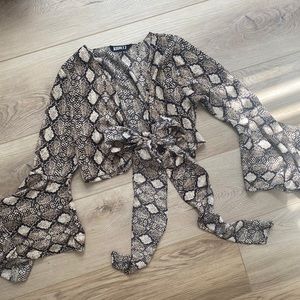 Snakeskin long sleeve wrap top